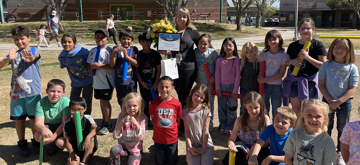 Teacher Excellence Award recipient with her students